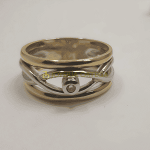 Anillo de oro y plata con diamante
